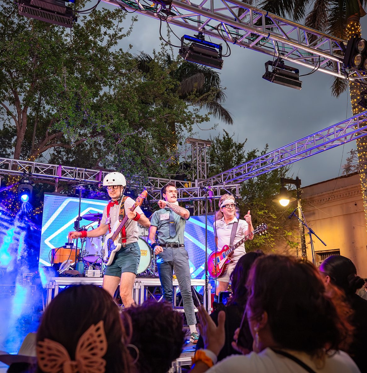 Band performing for a crowd at First Friday in downtown Brownsville