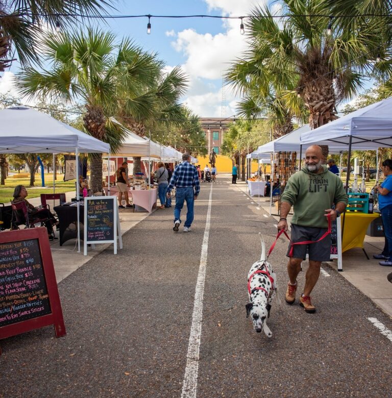 Visitors walking through the Brownsville Farmers Market